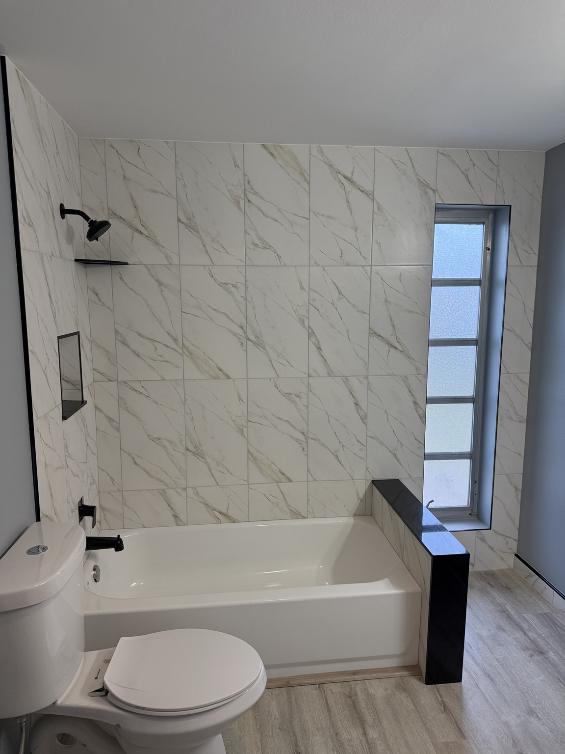 Full bathroom transformation before and after by Lanin Tile LLC — after
